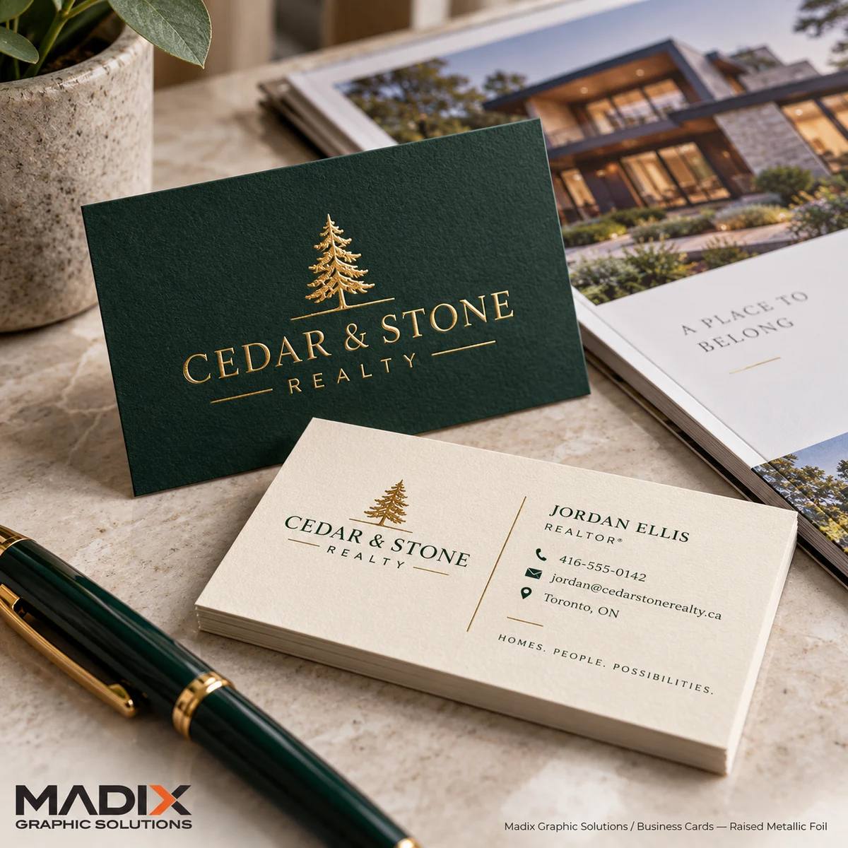 Raised metallic foil business cards printed by Madix