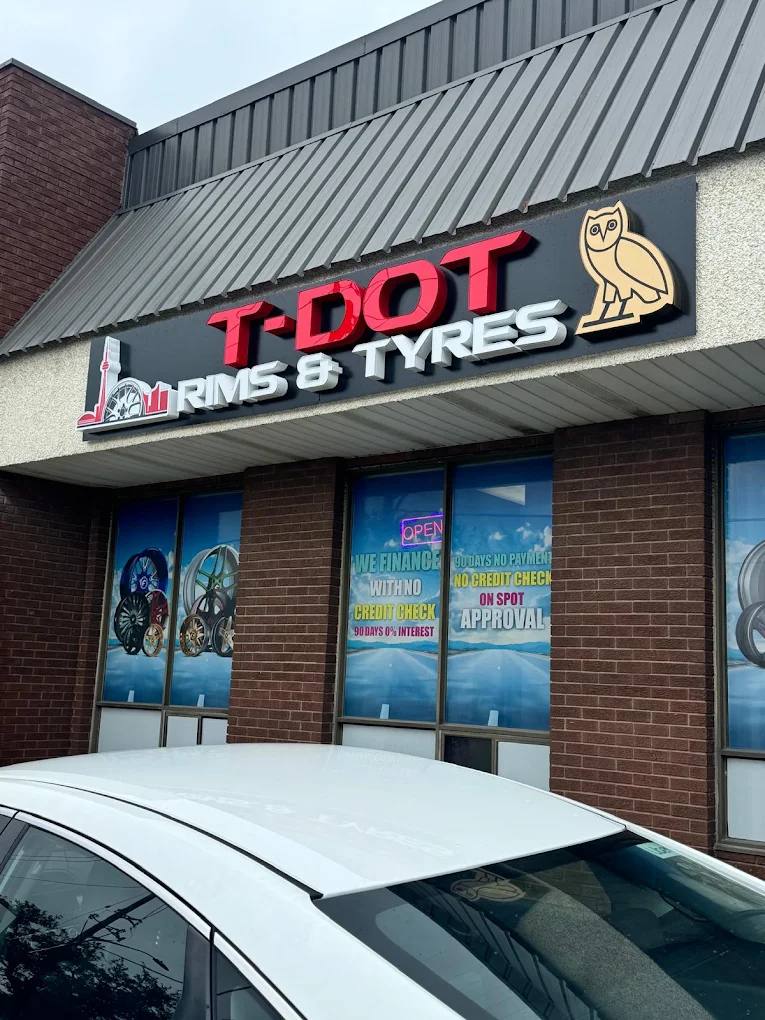 T-Dot Rims and Tyres storefront sign
